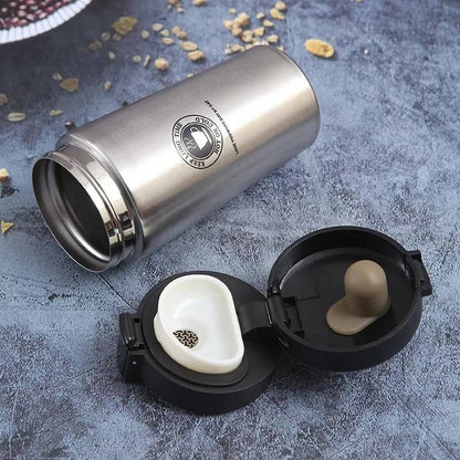 Miso station stainless steel insulated travel tumbler with open lid and spill-resistant push-button mechanism