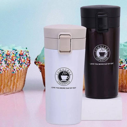 Miso station insulated stainless steel travel tumblers in white and dark brown with push-button lids and coffee logos