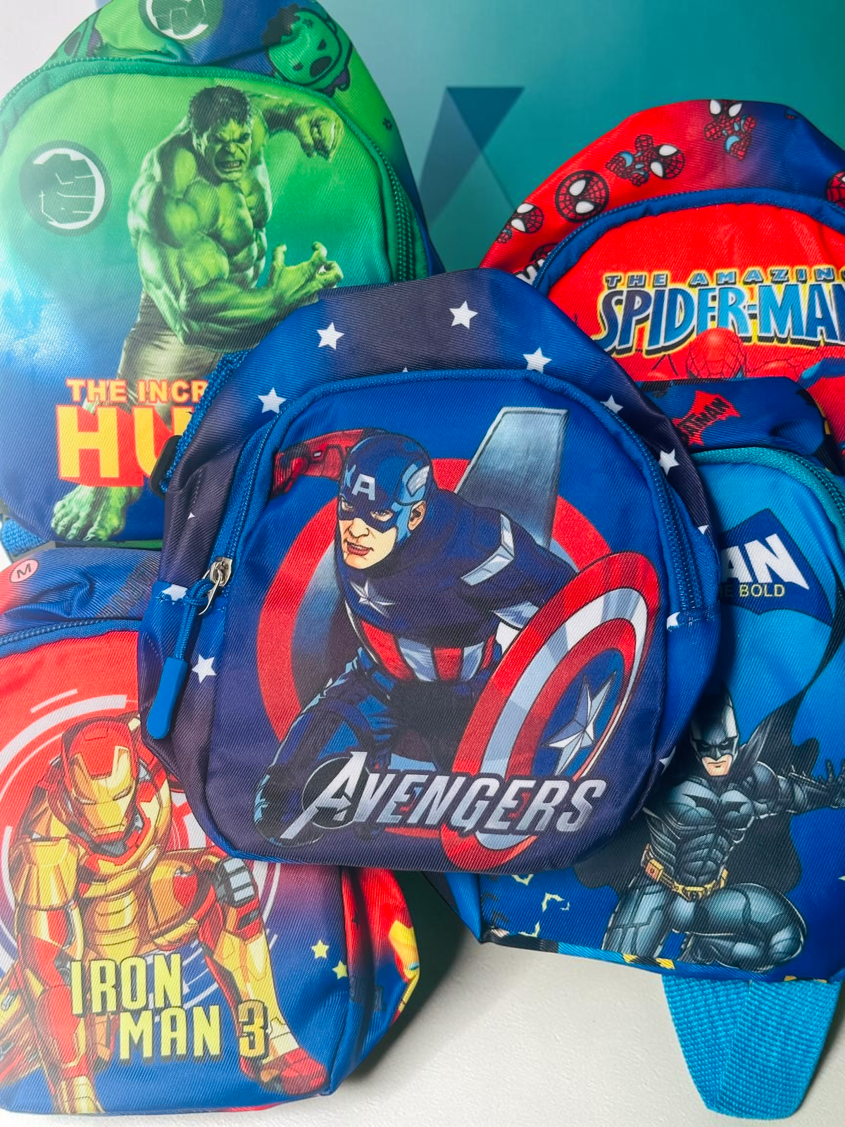 Miso station superhero kids mini backpacks featuring Iron Man, Hulk, Captain America, Spider-Man, and Batman designs.
