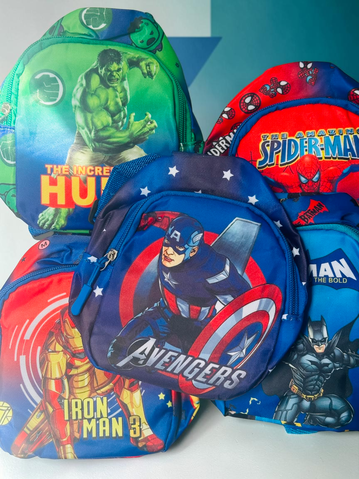 Miso station superhero kids mini backpacks featuring Hulk, Spider-Man, Captain America, Iron Man, and Batman graphics.