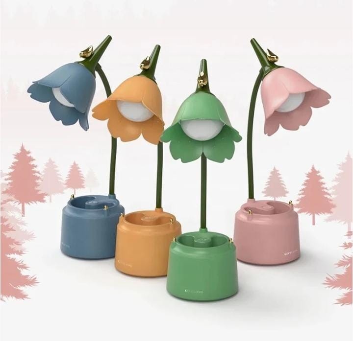 Miso station tulip-shaped desk lamps in blue, orange, green, and pink with flexible stems and storage bases.