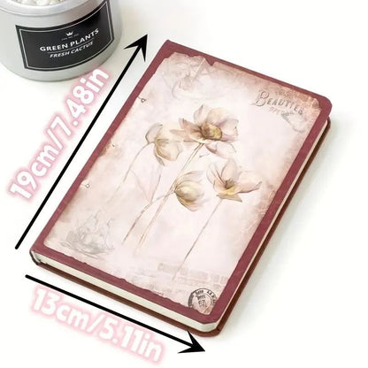 Miso station vintage floral hardcover journal with a weathered parchment cover and deep red binding.