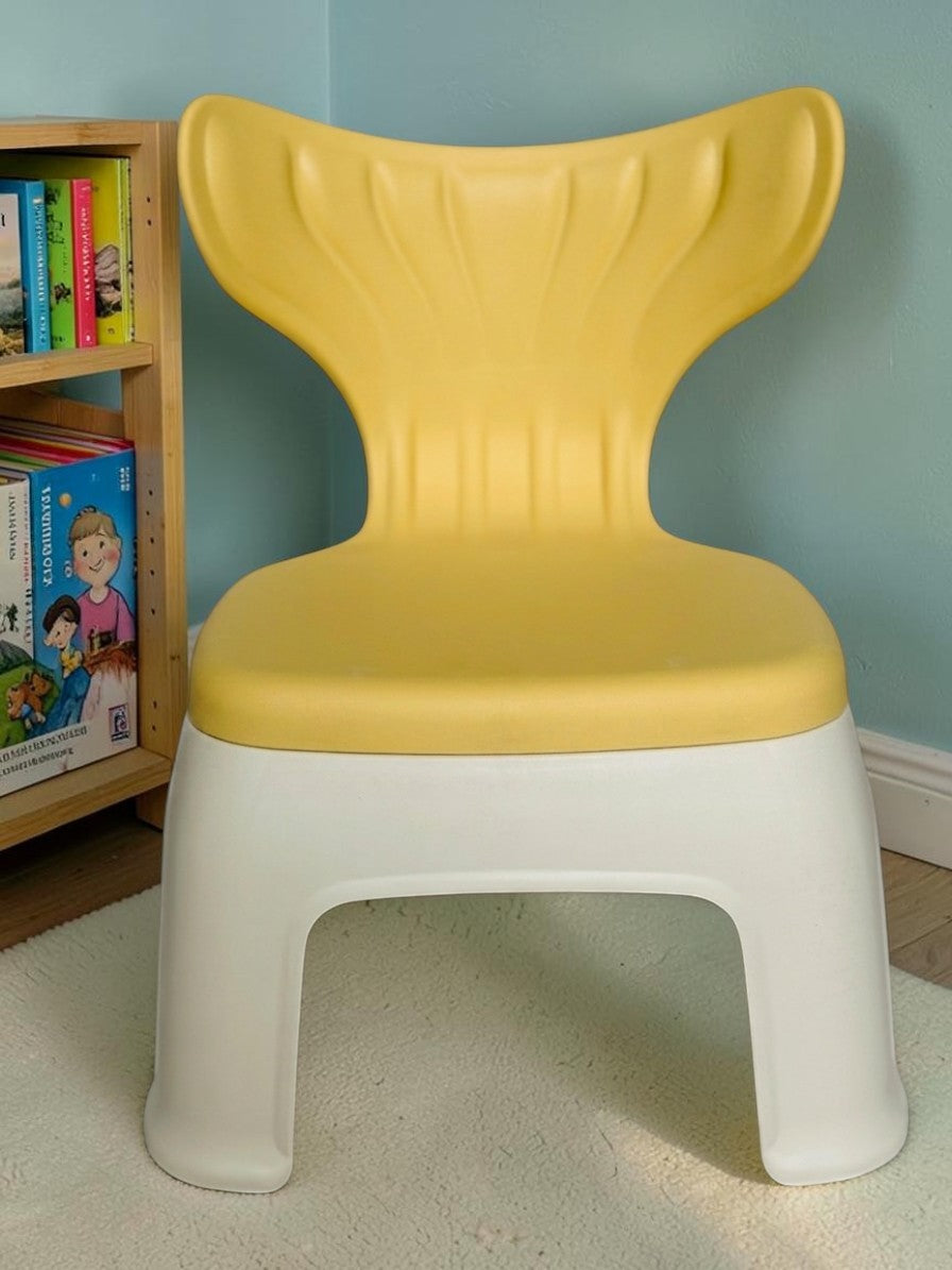 Miso station ergonomic toddler chair in yellow and white with a whimsical mermaid tail backrest for playrooms.