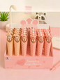 Miso station Mickey ice cream pens in a display box featuring cute mouse-shaped toppers and waffle cone barrels.