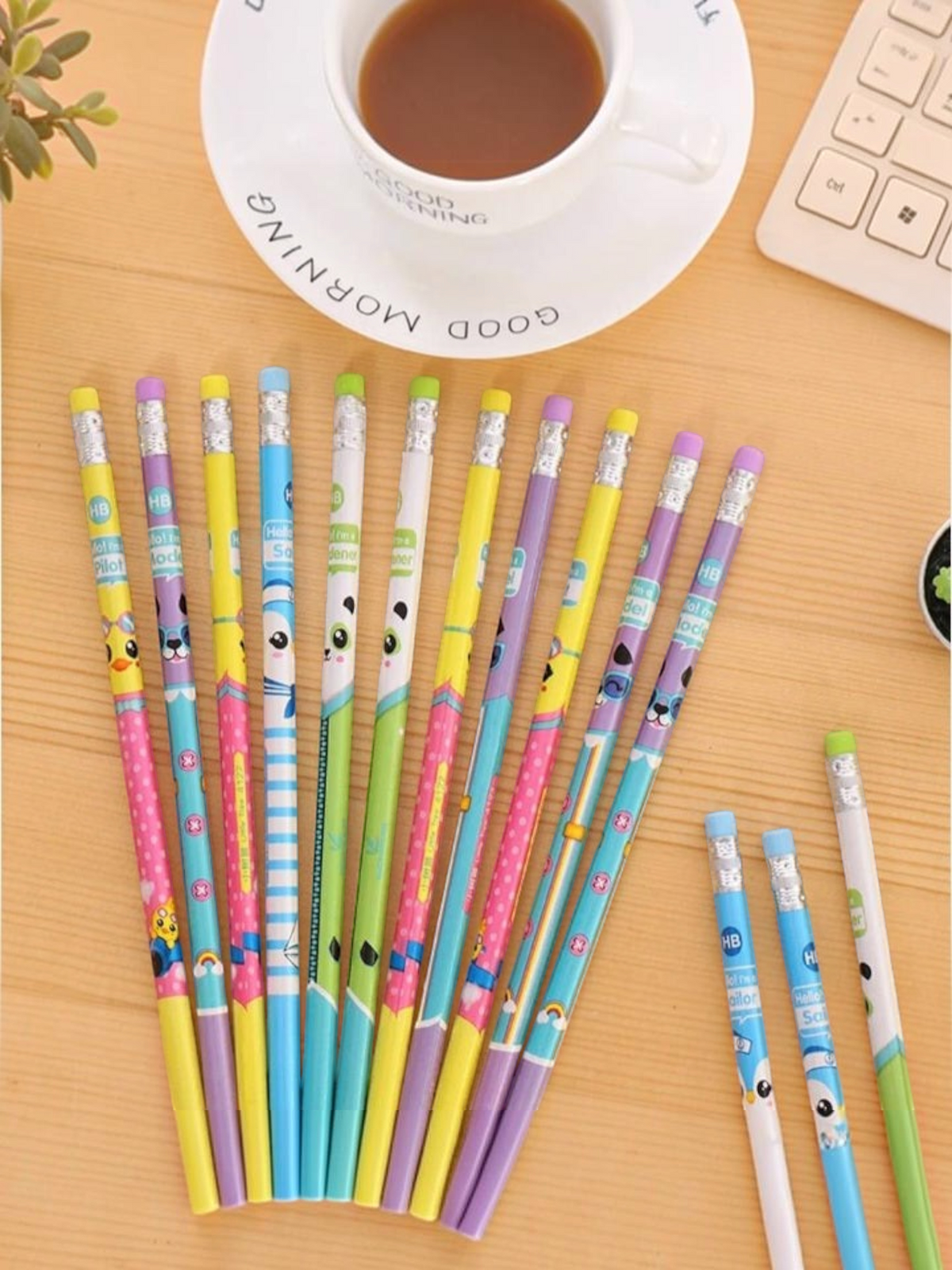 Miso station set of 12 colorful HB pencils featuring playful animal illustrations and erasers on wooden desk