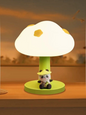Miso station Popo panda night lamp with a mushroom-shaped shade and green base on a wooden table