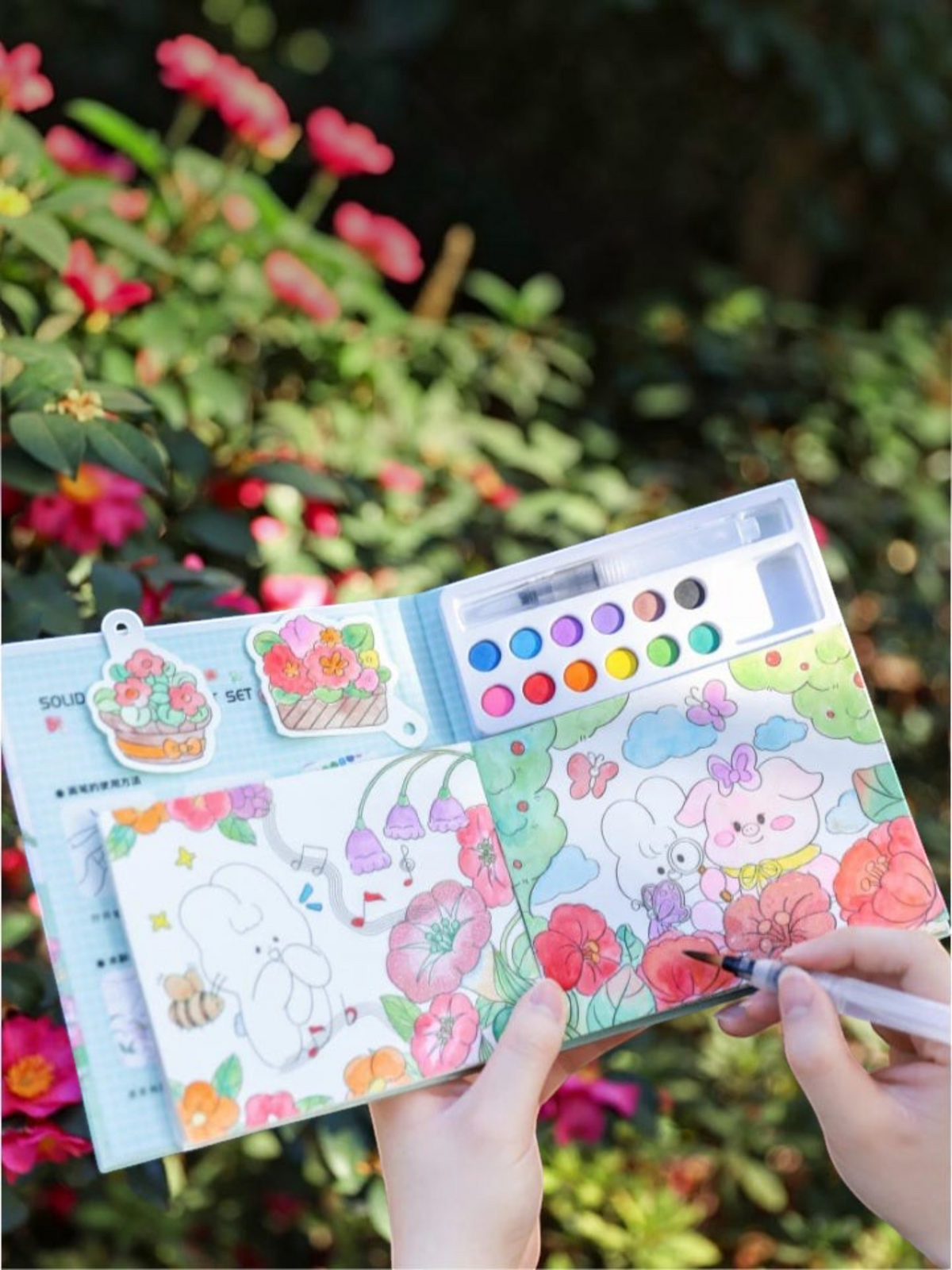 Miso station water colouring book with a refillable water pen and vibrant animal illustrations for kids